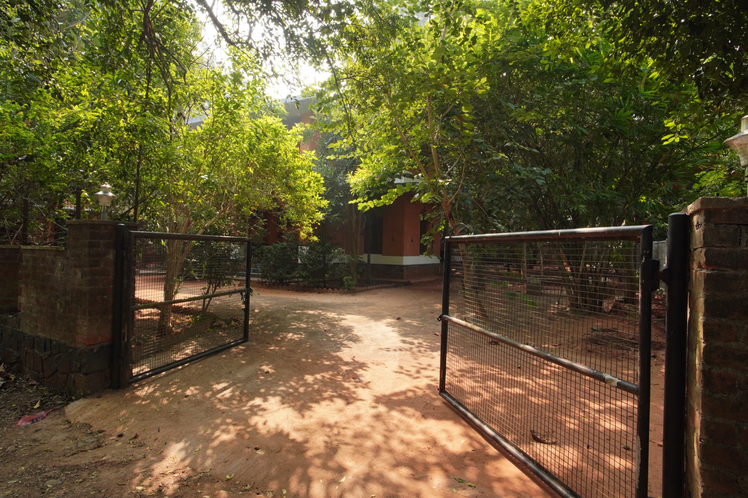 Entrance gate to Anpu cob retreat near Kalarigram and Adishakti Theatre, Auroville